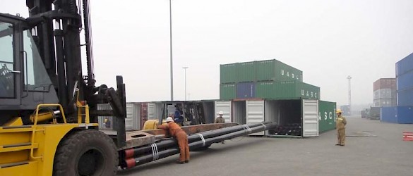Loading casing into container